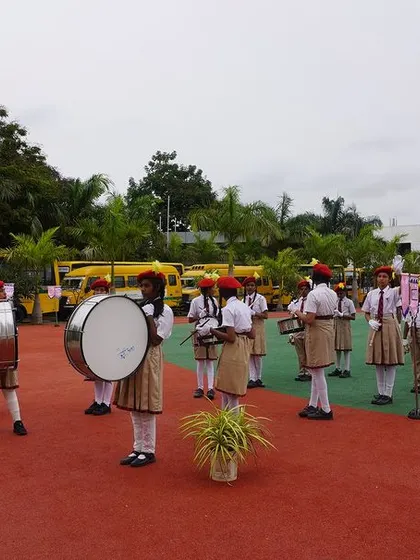 The school band stands ready, adding a sense of occasion and discipline to the Investiture Ceremony. Their performance is a key part of our formal events, showcasing student talent and coordination.