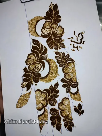 A stunning example of a Gulf-style design with bold floral elements and crescent shapes. This style relies on a mix of thick, dark application and fine, delicate details.