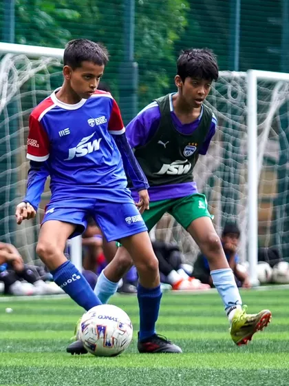 Intense action from the U13 JSW Youth League. These competitive matches are crucial for player development and provide valuable experience.