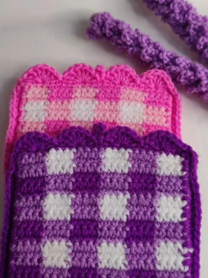 Cute and functional card holders. I've made them in various styles, including a pink camera design and a trendy gingham pattern in purple and pink.