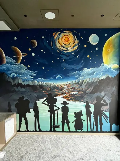 This is a custom anime mural I painted for a client's room. It features the iconic silhouettes from 'One Piece' against a dramatic, Van Gogh-inspired starry night sky, creating a truly unique universe.