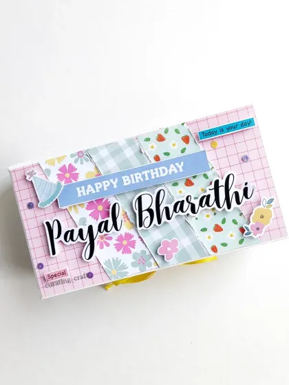 The surprise starts with the box itself. I personalize the outer box with names and themes, like this one for a birthday, giving a hint of the fun that's waiting inside.