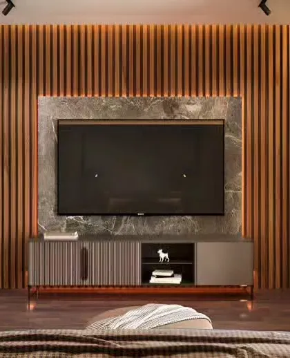 A minimalist TV wall featuring a dark marble slab centered on a fluted wood panel. The simple, low-profile console keeps the focus on the premium materials and clean lines.