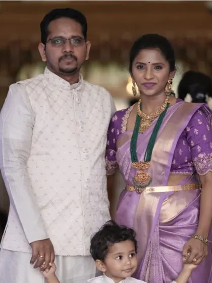 A client and her family, her elegant purple blouse a perfect choice for the festivities.