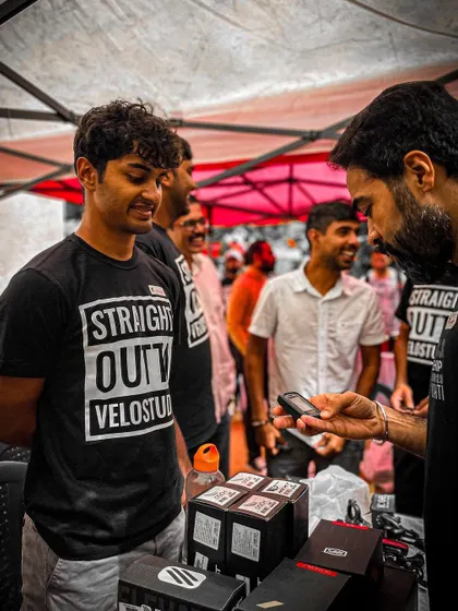 Browsing for deals. The Velo Studio stall is busy with customers looking for new gear and accessories.