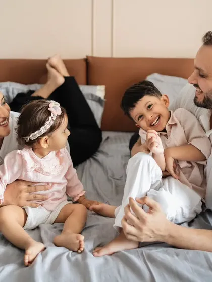 A candid moment of pure joy with this beautiful family of four during a relaxed lifestyle session on the bed. I love capturing these unposed interactions, where the laughter is real and the connections are clear, from the playful tickles to the happy smiles.