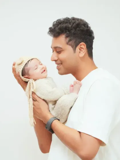 The special bond between a father and his newborn baby. These quiet, tender moments are among the most precious to capture.