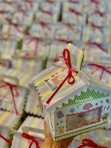 A large order of our hut-shaped baby shower favors, ready to be gifted to guests.