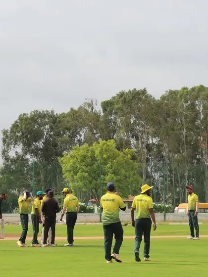 Players from two teams walk onto the field, ready for their match in the Sindoor Friendship Cup, an open-age T20 event.