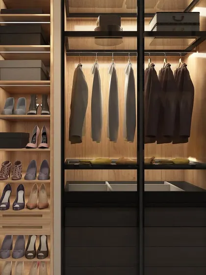 A detailed view of the walk-in closet concept, showing specialized compartments for shoes, accessories, and hanging clothes, ensuring that every item has its place.