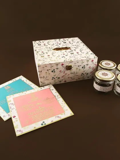 A duplicate of ID 93 and 99, showcasing the charming floral print and the four gift jars included in this invitation set.