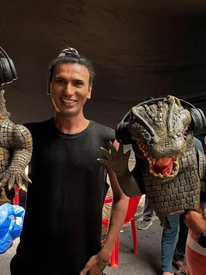 My talented team of puppeteers, Kaustubh and Kailash, posing with the crocodile puppets they helped bring to life. Collaborative effort is key to the success of these large-scale projects.
