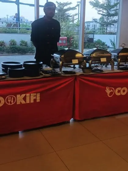 A compact and neat buffet setup for a house party. We can create an elegant food station in any space.