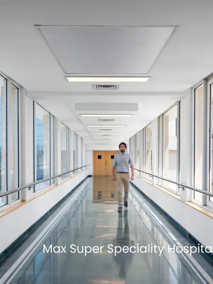 This corridor at Max Super Speciality Hospital is another example of our evidence-based approach. Material and color strategies draw on environmental psychology, incorporating earthy tones and natural lighting to create a calm and restorative visual environment.