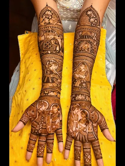 A full-coverage design rich with stories. It includes portraits of the couple, figures of Radha and Krishna, and elements of a royal procession, making it a masterpiece of bridal henna art.