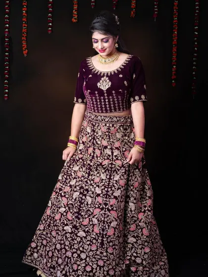 This purple velvet lehenga is a perfect rental for anyone wanting a royal and elegant traditional look.