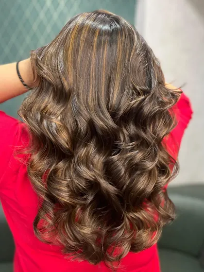 Another angle of the golden locks, showing how the highlights catch the light and create dimension.