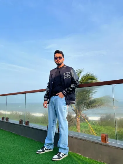 A full-length view of my casual look against a scenic backdrop.