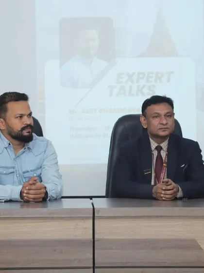 Seated with a senior faculty member during the expert talk session.