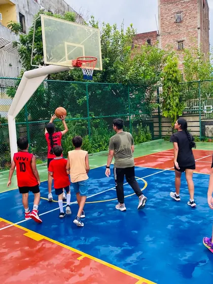 A layup attempt during a rainy practice session.