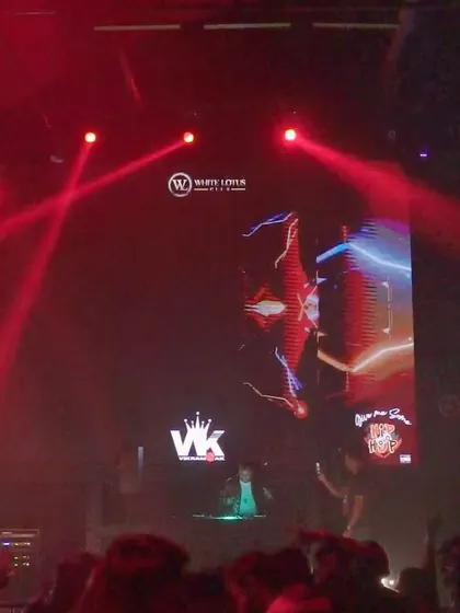 On stage at the White Lotus Club. The massive LED screen and light show create an epic backdrop for a high energy hip hop set.