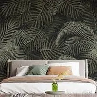 A detailed view of the dark tropical leaf pattern, perfect for creating a sophisticated and moody atmosphere. This design works well in bedrooms or living rooms for a touch of modern drama.