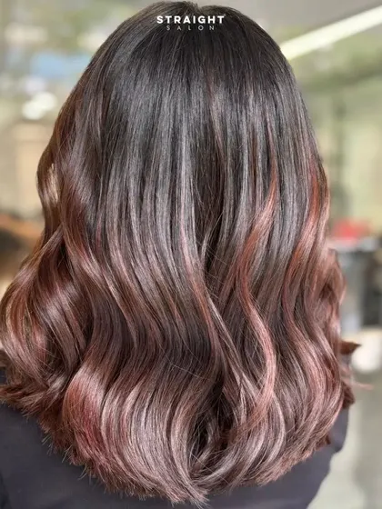 With good-looking hair, I can deal with anything. This look features a beautiful blend of dark hair with subtle reddish-brown highlights.