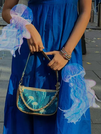 I added these ethereal jellyfish doodles to match the jellyfish print on my bag, creating a cohesive and dreamy look.