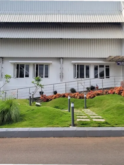 A view of the sculpted mounds and pathway at an industrial site. This project demonstrates our commitment to creating engaging and aesthetically pleasing landscapes for all our clients.