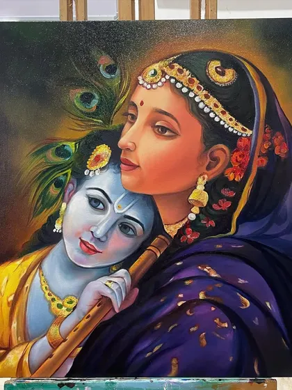 The final version of my oil painting depicting Radha and Krishna. This piece showcases a more traditional and detailed style compared to my drip-art, demonstrating my versatility in creating devotional art.