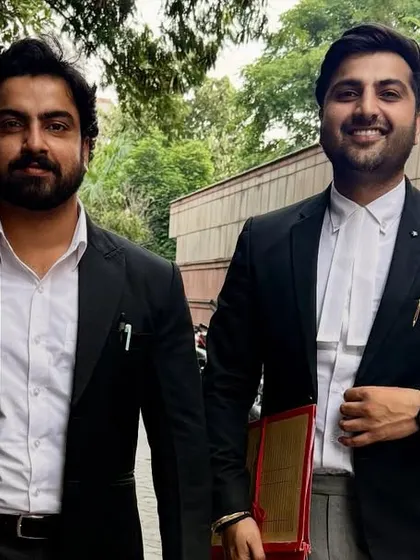 With my brother outside the court. Our family bond translates into a powerful partnership when fighting for our clients' rights.