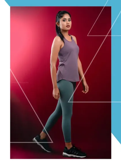 A fitness and activewear portrait. The strong pose and athletic attire are perfect for a model looking to book sports or lifestyle campaigns.