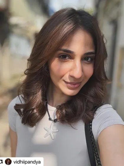 A selfie from Vidhii Pandya, showing off her fresh haircut from a different angle.