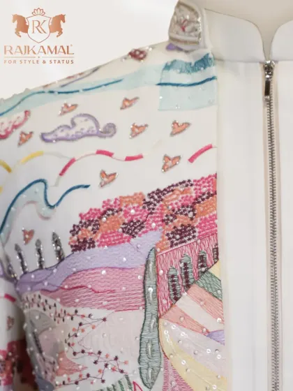 A close-up of the zipper and collar detail on the landscape-embroidered Jodhpuri, highlighting the fine craftsmanship and modern construction.