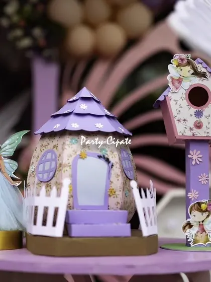 Miniature fairy houses and birdhouses were part of the detailed props for this enchanted forest theme. Each piece is carefully selected or crafted to fit the magical narrative of the event.