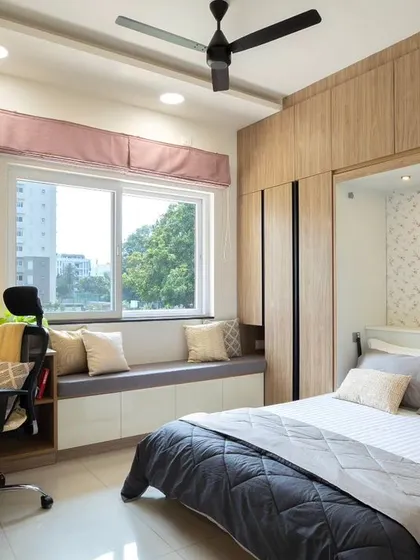 This guest bedroom doubles as a home office, a perfect example of my approach to compact home design. The Murphy bed folds away seamlessly, transforming the room and maximizing its functionality for daily use.