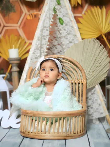 A pensive moment from the boho-themed milestone shoot.