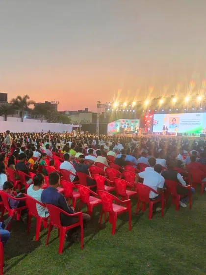 Another view of the incredible audience at the Anand Group's 'Rasarang 2025' event as they watch the sand art biography.