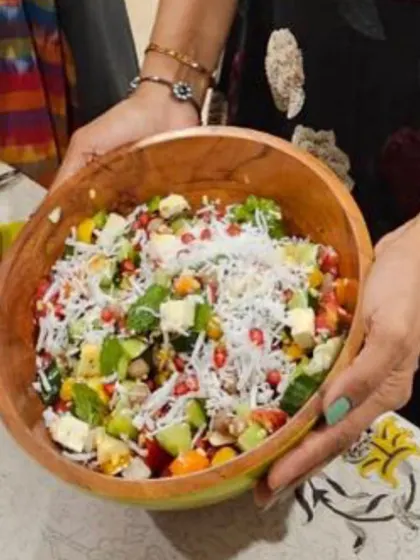 Holding up the final creation from our summer workshop. This colorful, nutrient-dense salad is a perfect example of how delicious and beautiful healthy eating can be.