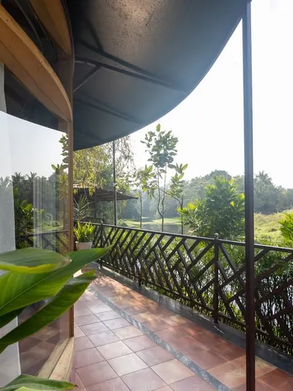 A view from the cottage balcony, a perfect spot to watch the river flow and enjoy the peaceful atmosphere.