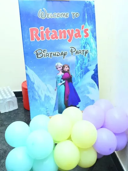 A welcome sign for Ritanya's 'Frozen' themed party, greeting guests with a touch of winter magic.