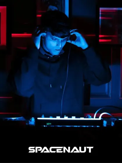 Focused and ready to drop the next beat. The concentration behind the decks is real.