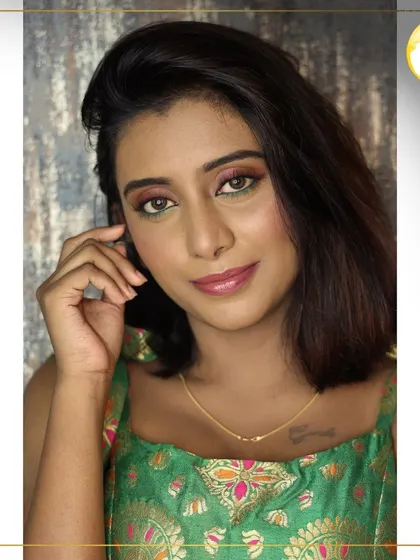 This look features a unique combination of green and pink eyeshadow. It shows my ability to play with color in a way that is still wearable and beautiful.