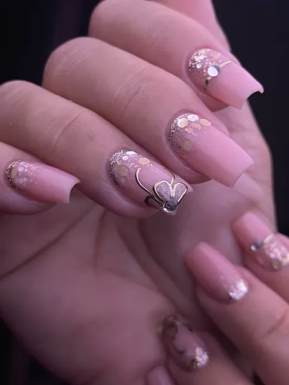 A different angle of the pink and gold glitter set, showing the dimension of the glitter and the clean lines of the wire art.