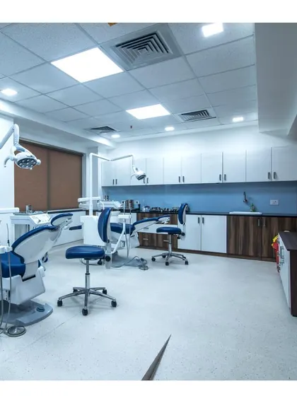 A dental treatment room in the Memorial Hospital. We design clinical spaces to be highly functional, with careful consideration for equipment placement, ergonomics for the staff, and a sterile environment.