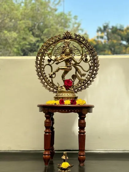A close-up of the Nataraj idol, the Lord of Dance, set against the natural backdrop visible from our studio window. This blend of divine art and nature is what I strive to create in my classes.