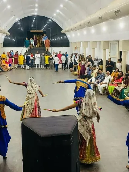 A beautiful synchronized moment from a Garba performance. We choreograph routines that look great from every angle.