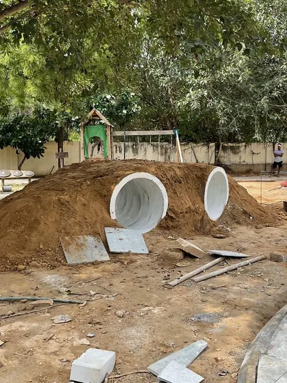 A fun element taking shape at a school landscape project: a play mound with concrete tunnels. We believe in creating interactive and imaginative play features that are integrated directly into the earthworks.