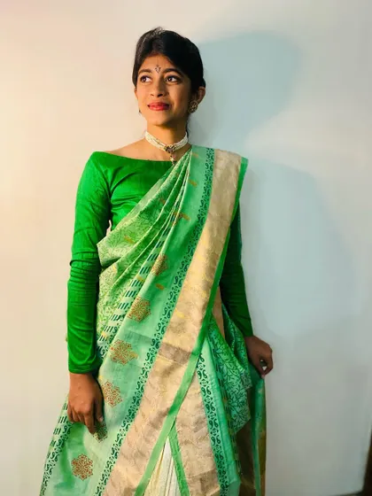 A full look at the modern styling of a revamped traditional saree. It’s all about preserving memories while embracing a fresh style.