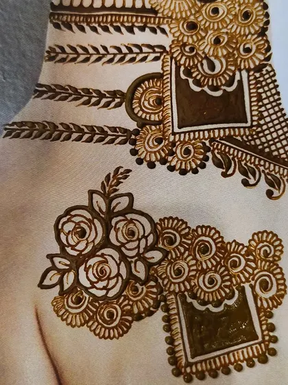 Another angle of the same design, showing how different motifs like roses and geometric squares can be balanced to create a harmonious and modern composition.